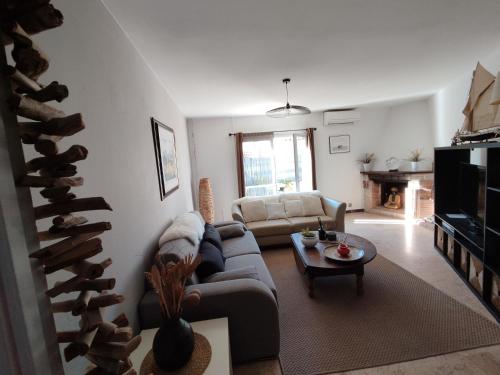 Les Palmiers, T2 confortable en rez de jardin, bord de mer, terrasse