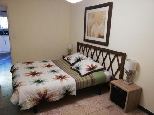 Les Palmiers, T2 confortable en rez de jardin, bord de mer, terrasse