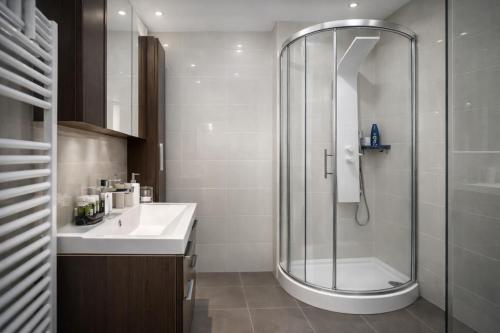 a bathroom with a shower and a sink at Sunrise Villa in Kassandra