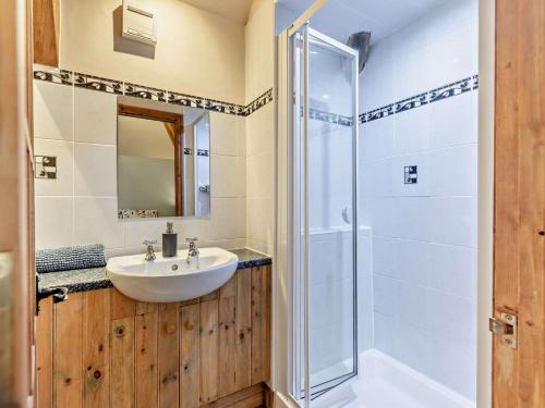 a bathroom with a sink and a shower at 3 Bed in Winkleigh oc-1450b in Iddesleigh