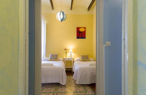 Postel nebo postele na pokoji v ubytování Casa Juramento