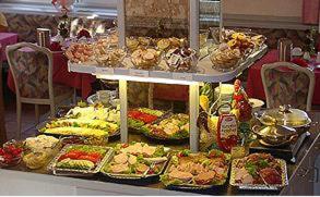 a buffet filled with different types of food on a table at Haus am Park in Bad Hersfeld