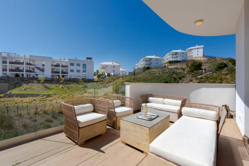 Paula Lemac - Stylish El Higueron Apartment with Sea Views, Spacious Terrace & Comfort