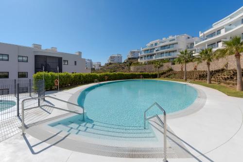 Paula Lemac - Stylish El Higueron Apartment with Sea Views, Spacious Terrace & Comfort