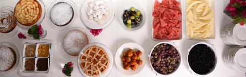 a bunch of different types of food in bowls at Agriturismo Giorgio in Mattinata