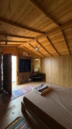 a bedroom with a large bed in a room at Anne in Nuweiba