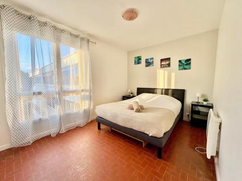 Appartement T2 avec balcon, résidence arborée, parking
