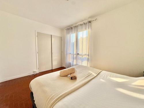 Appartement T2 avec balcon, résidence arborée, parking