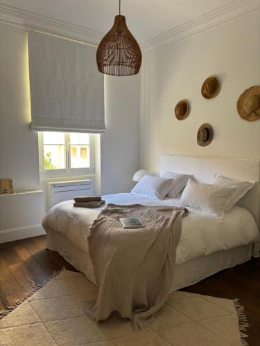a bedroom with a bed with a blanket on it at A Casa Di Rose in Ajaccio