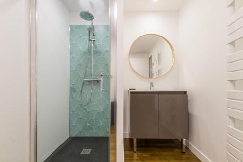a bathroom with a sink and a mirror at Gîte G593 in Le Val-Saint-Père
