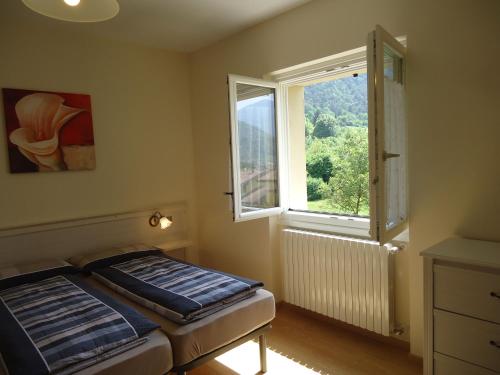 Postel nebo postele na pokoji v ubytování Villa Ninfea