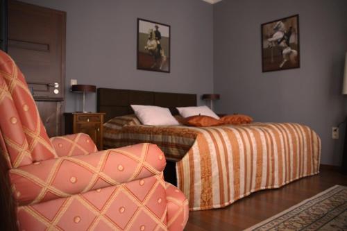 Łóżko lub łóżka w pokoju w obiekcie Moszna Apartments