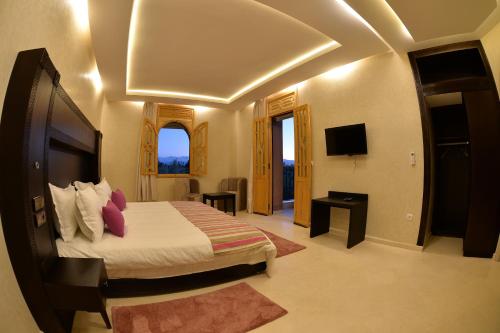 Ferme Sidi Safou & Spaにあるベッド