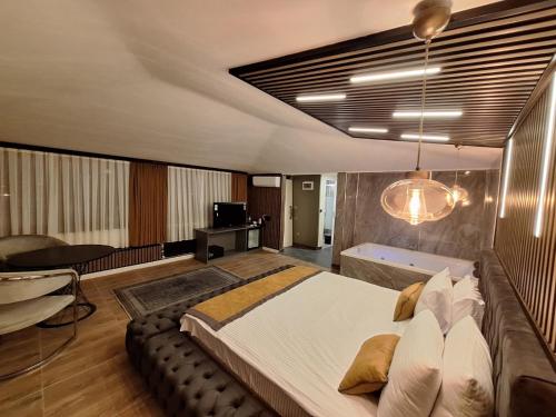 a bedroom with a large bed in a room at The Best City Kadikoy in Istanbul