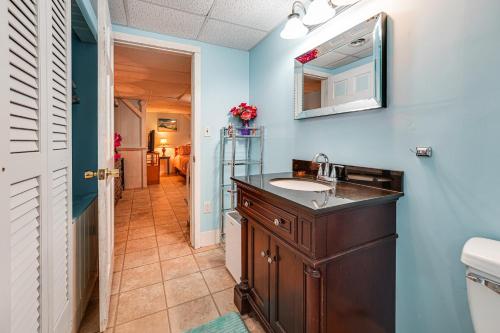 a bathroom with a sink and a mirror at 3 Mi to Bath Historic District! Stylish Studio in Harding