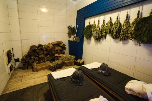 a room with a table with hats on a wall at Гук готельно-ресторанний комплекс in Bukovel