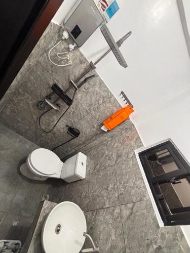 an overhead view of a bathroom with a toilet at Perrera Guesthouse in Santa Ana