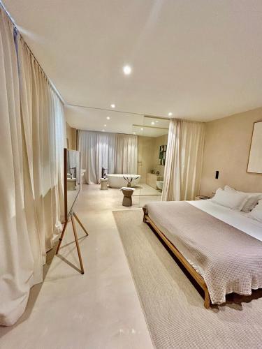 a bedroom with a bed and a television in it at KIKO Luxury Lifestyle in Zadar