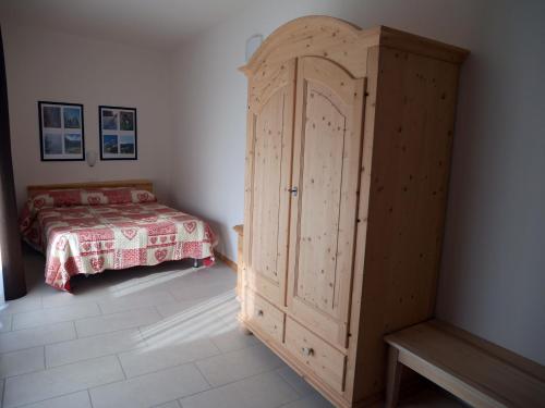 Postel nebo postele na pokoji v ubytování Hotel Elbele Garnì