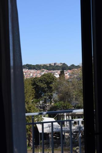 a view of a city from a window at The ViewPoint VP2 - Το διαμάντι της θέας in Mytilene