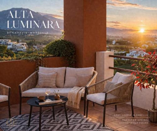 a balcony with a couch and two chairs and a table at Alta Luminara Boutique Residence Sea View Terraces Marbella Hills in Benahavís