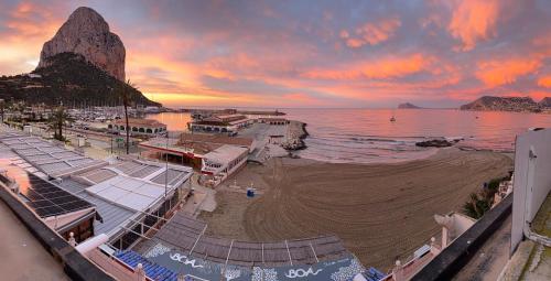 an aerial view of a beach at sunset at Ti Miquel in Ifach