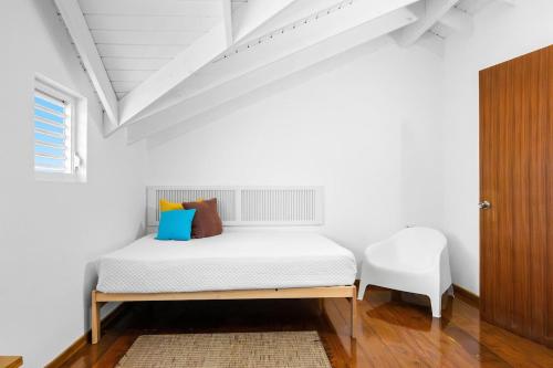 A bed or beds in a room at Casa Brisa