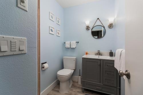 a bathroom with a toilet and a sink at Cavalier Condos #32 in Lincoln City