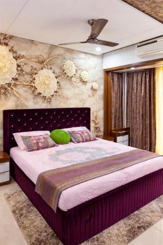 a bedroom with a large bed in a room at Shri krishna paradise in Panvel
