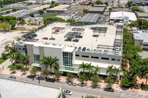 an aerial view of a building with a parking lot at Luxury Condo - 3B3B with Amazing Skyline View in Miami