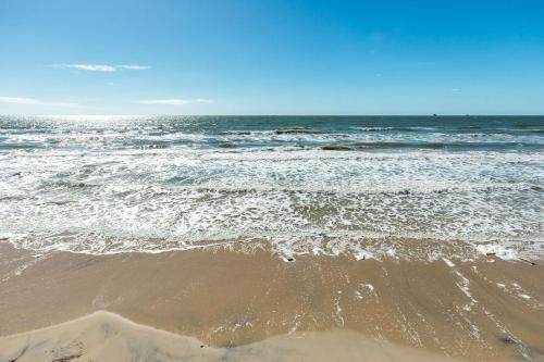 a view of the ocean from the beach at Paradise Point - Barefoot Beachfront Living in Surfside Beach