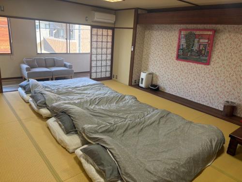 Guesthouse NanairoDougoなないろゲストハウス