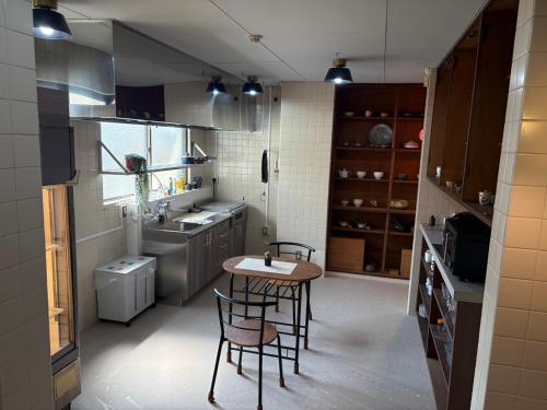 Guesthouse NanairoDougoなないろゲストハウス