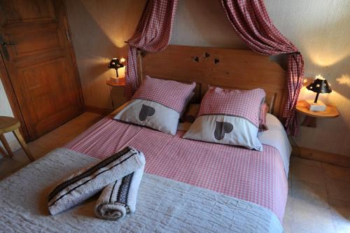 Postel nebo postele na pokoji v ubytování Chalet Génépi