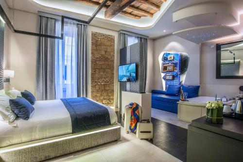 Posteľ alebo postele v izbe v ubytovaní Via Veneto Prestige Rooms