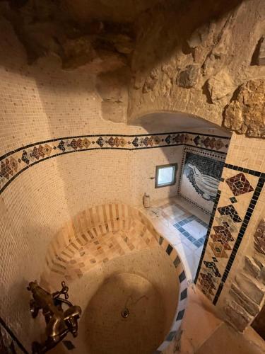 an overhead view of a bathroom in a building at La Torre della Bella Ragazza in Suvereto
