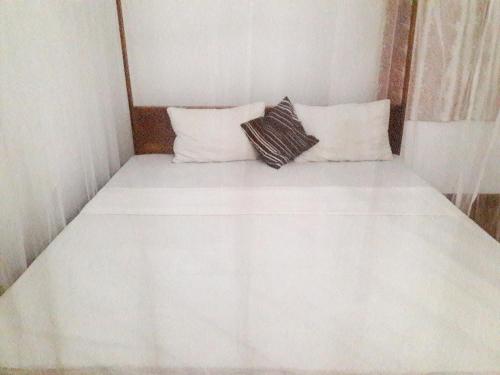 Cama o camas de una habitación en Paradise Beach House