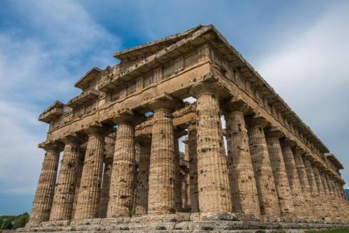 a temple at the acropolis of athens against a blue sky at Palazzo Gargano in Prignano Cilento