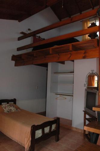 Ένα ή περισσότερα κρεβάτια σε δωμάτιο στο Hosteria Amaneseres