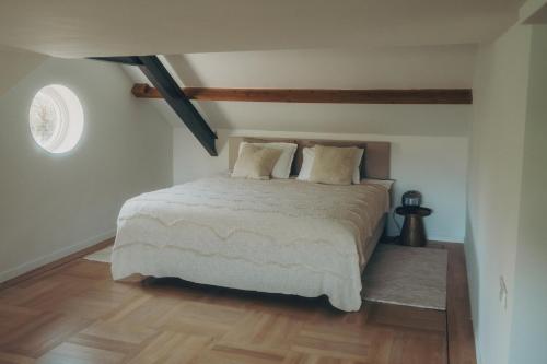 Llit o llits en una habitació de Hoeve1675