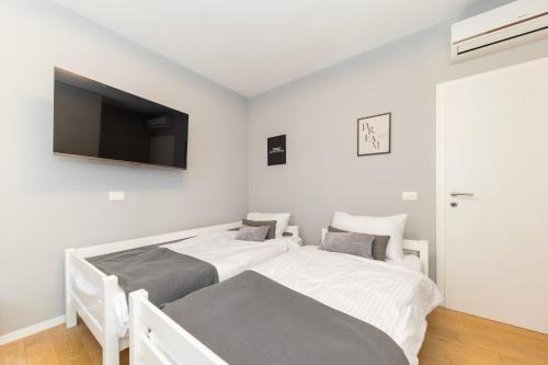 Premium Garden Escape by Belmont Realty
