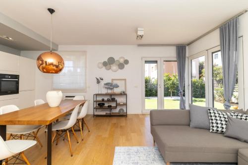 Premium Garden Escape by Belmont Realty
