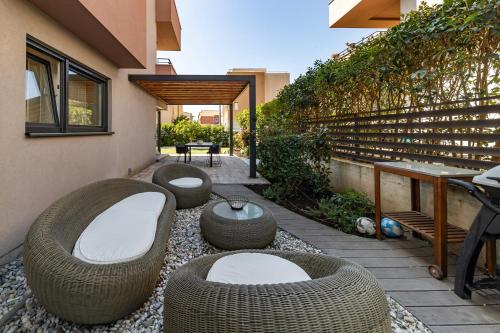 Premium Garden Escape by Belmont Realty