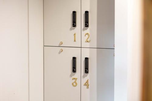a white cabinet with numbers on it at The Kylestrome in Ayr