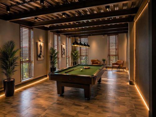 a billiard room with a pool table in it at Click Hotels Lite Chakan in Pune