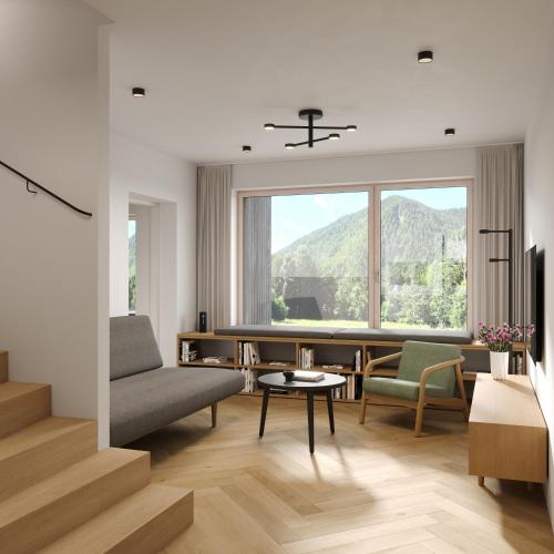 a living room with a couch and a table at NOOK - Nature Hideaway in Bad Aussee