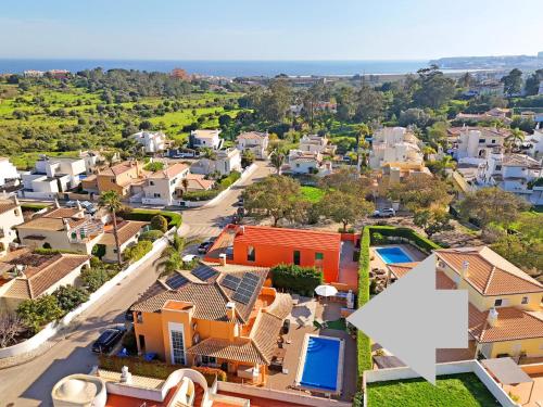 an aerial view of a town with houses at Canto do Sol, 4 Bedroom Villa in Lagos