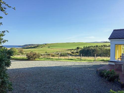 a view of a field from a house at Teenys Cottage in Flashader