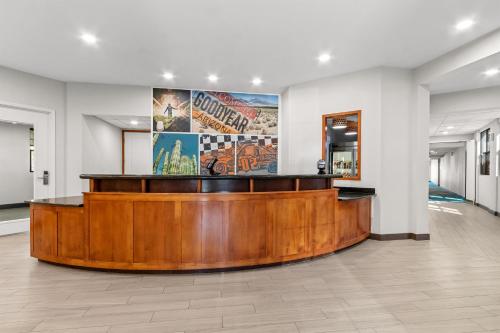a courtroom with a wooden reception desk in a building at Sonesta ES Suites Phoenix Goodyear in Goodyear
