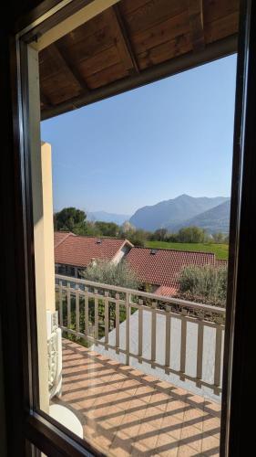 a view from a window of a balcony at Bosco Di Lago in Solto Collina